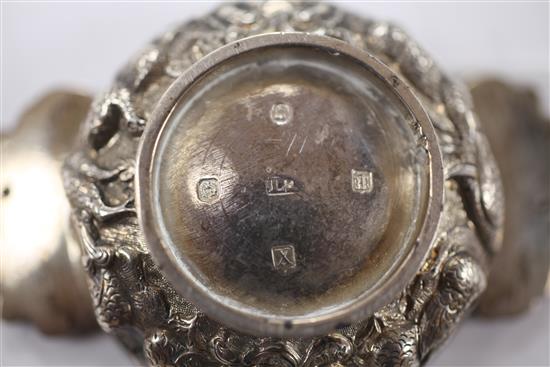 A George IV Scottish embossed silver quaich, 4.25in over handles.